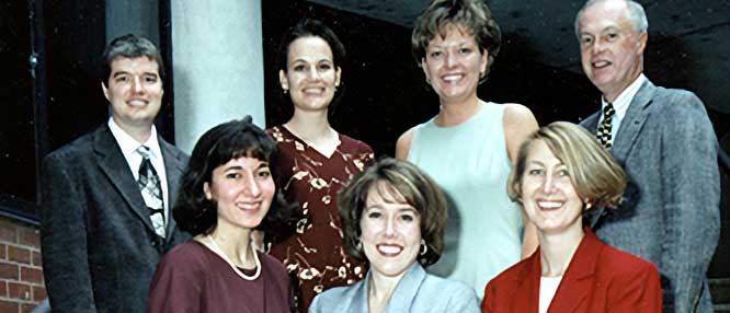 seven smiling residents from the class of 1999