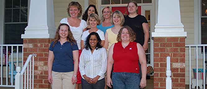 nine smiling residents from the class of 2009