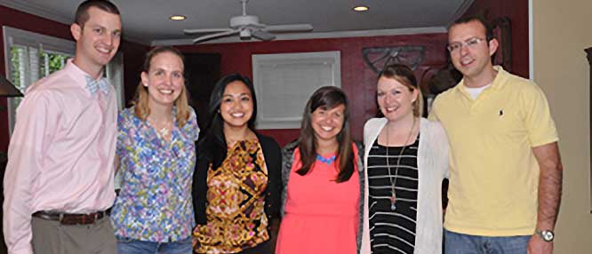 six smiling residents from the class of 2014